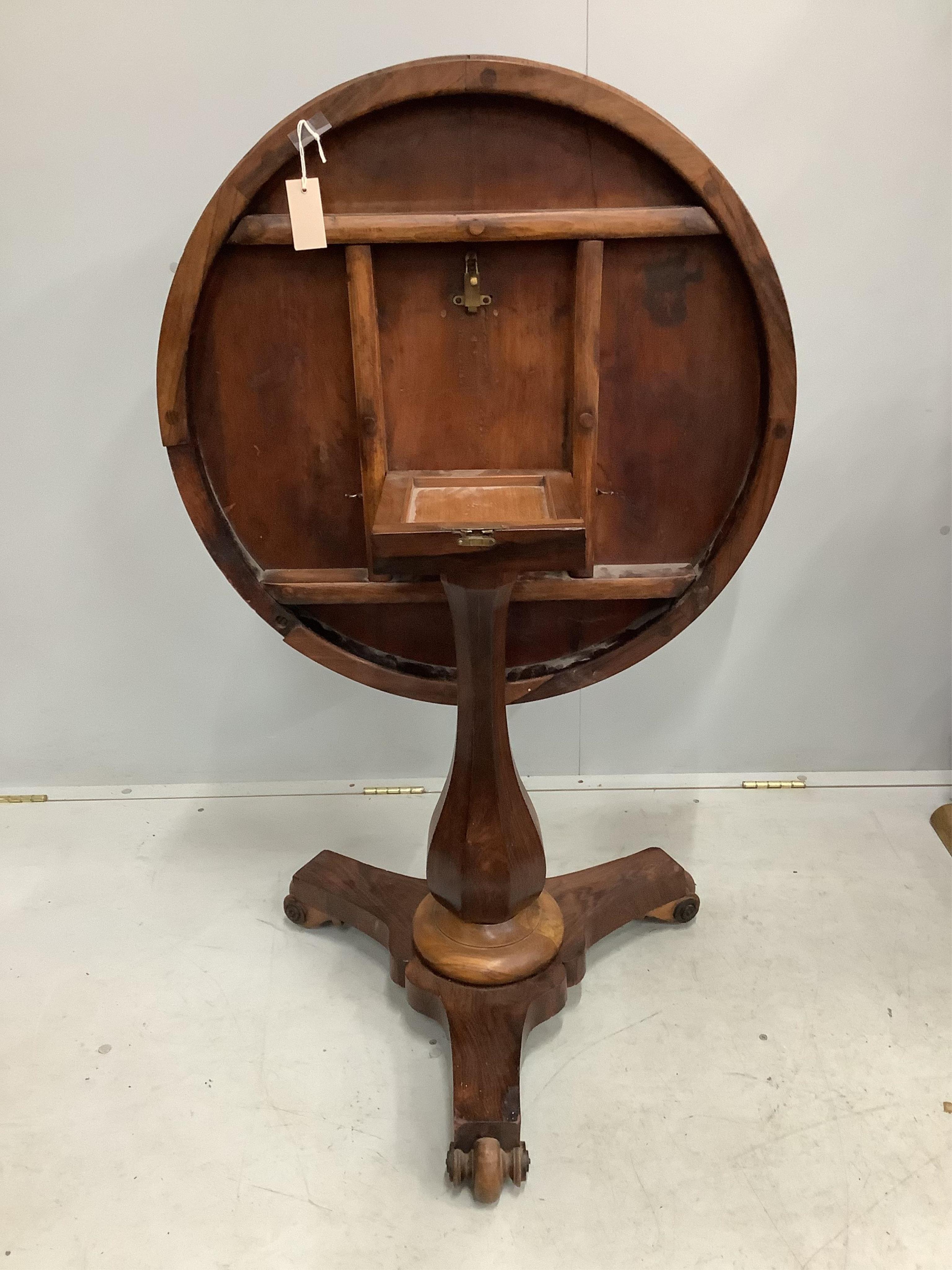 An early 19th century Continental rosewood, walnut and satinwood centre table, with parquetry top, diameter 76cm, height 75cm. Condition - fair to good